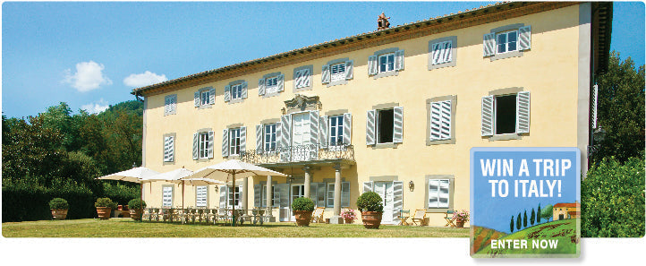 Sunlit Italian villa with lawn and patio seating, promotional badge reading Win a trip to Italy! Enter now