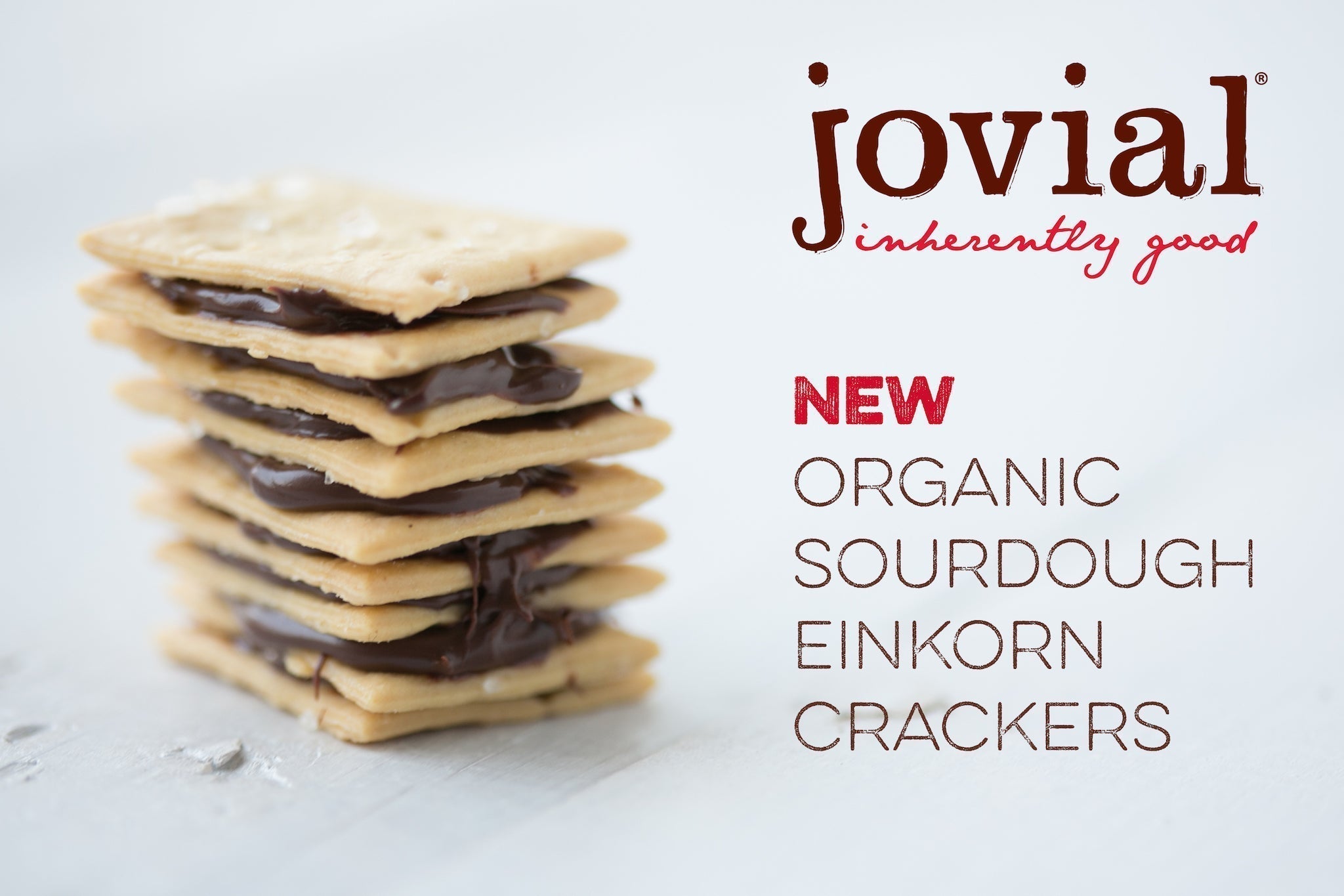 jovial inherently good NEW ORGANIC SOURDOUGH EINKORN CRACKERS — Jovial logo and stacked chocolate-filled crackers.
