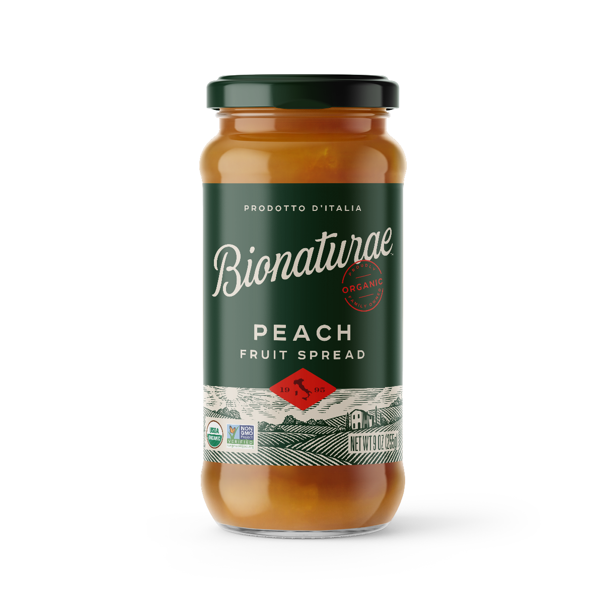 Front view of 9 oz Bionaturae organic peach fruit spread jar with green label and peach-colored spread on white background