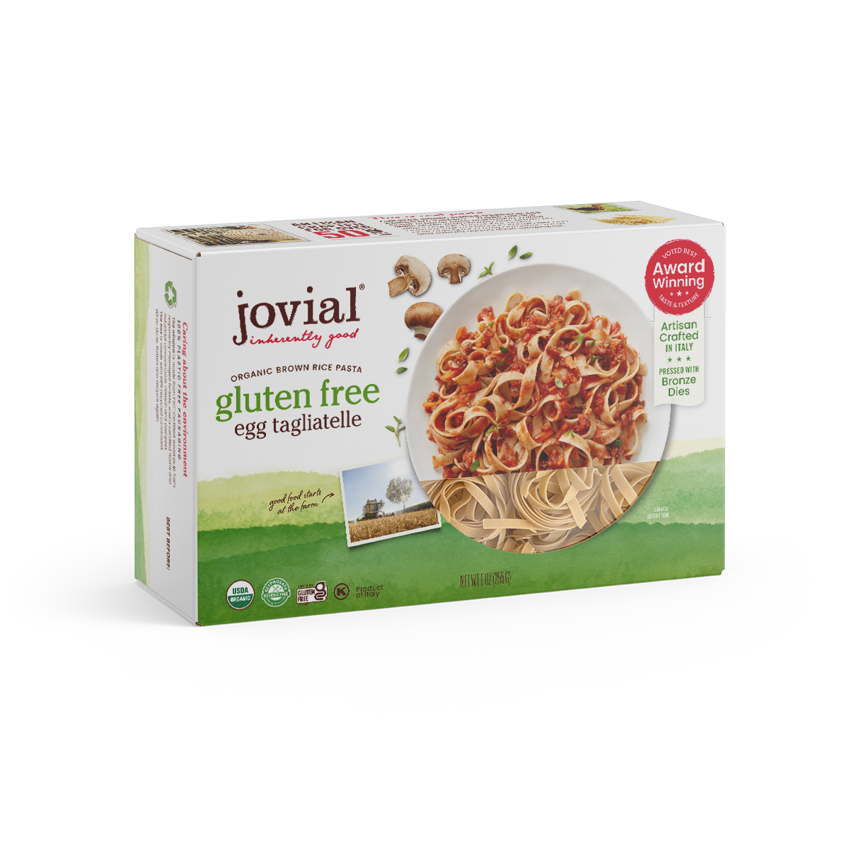 Three-quarter view of Jovial Organic Gluten Free Brown Rice Egg Tagliatelle box with cooked pasta photo and red award badge