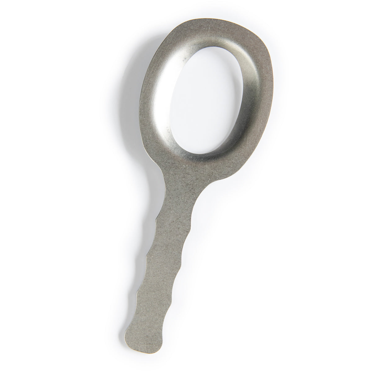 Top view of Einkorn kneading tool showing oval center hole and scalloped handle in polished stainless steel on white background