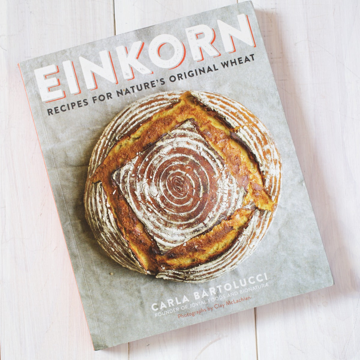 Flat lay of Einkorn Sourdough Baking Kit showing kit packaging and included ingredients on white background