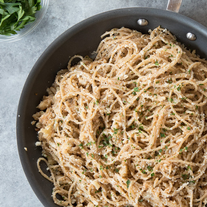 Front view of Organic Einkorn Traditional Spaghetti package showing dry einkorn spaghetti strands on a white background