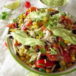 smoked salmon corn cabbage bowl with avocado lime crema