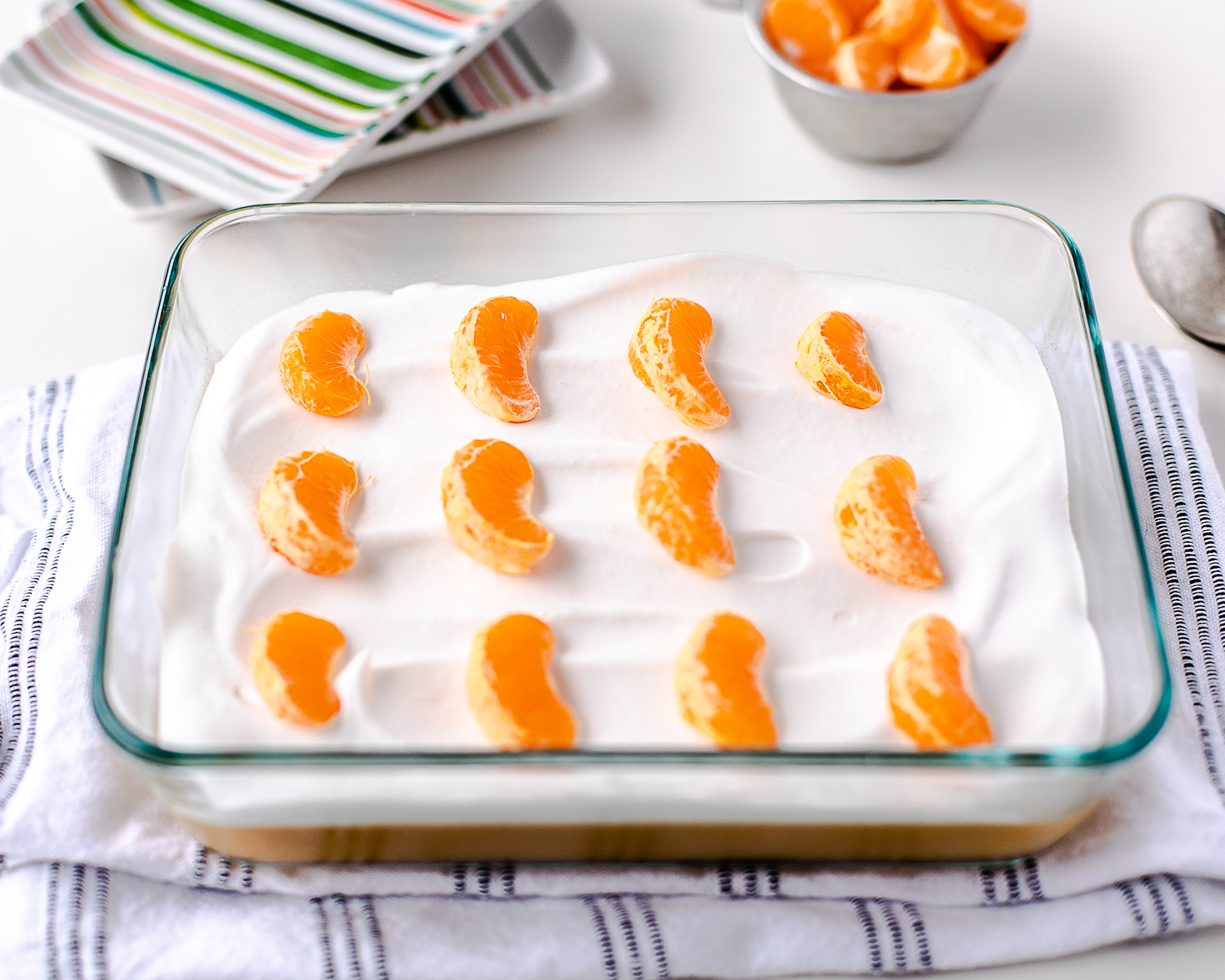 dairy free whip cream on orange jello salad