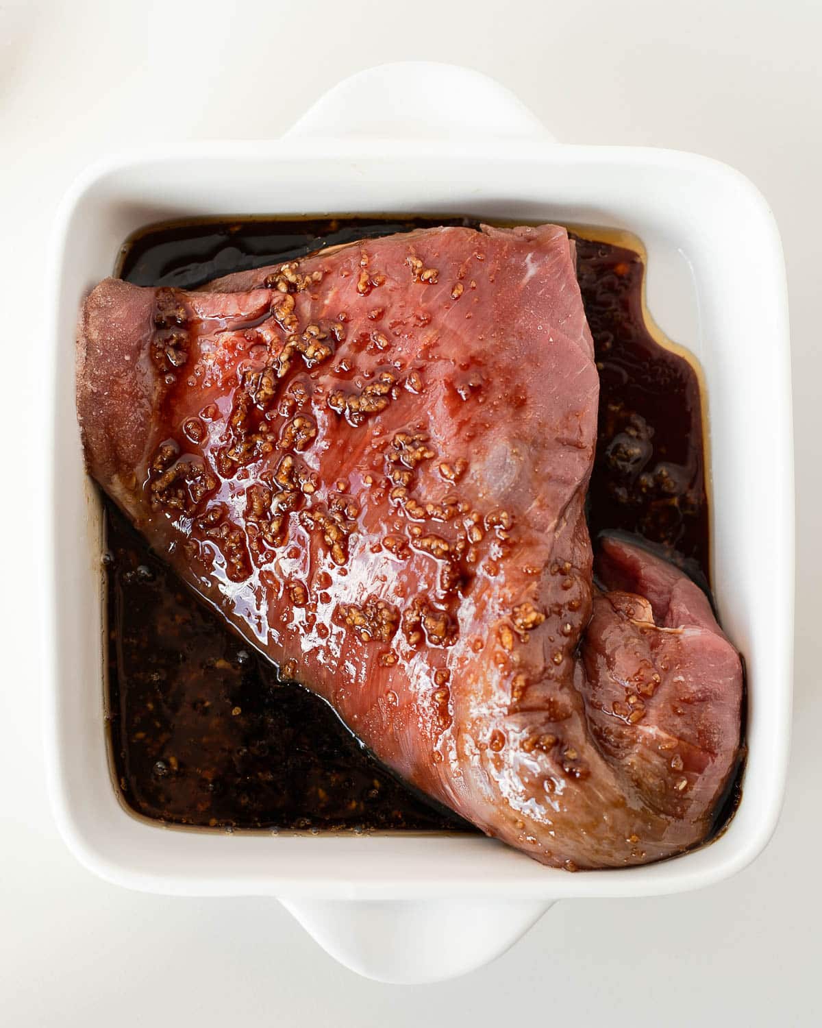 meat marinating in tri tip marinade