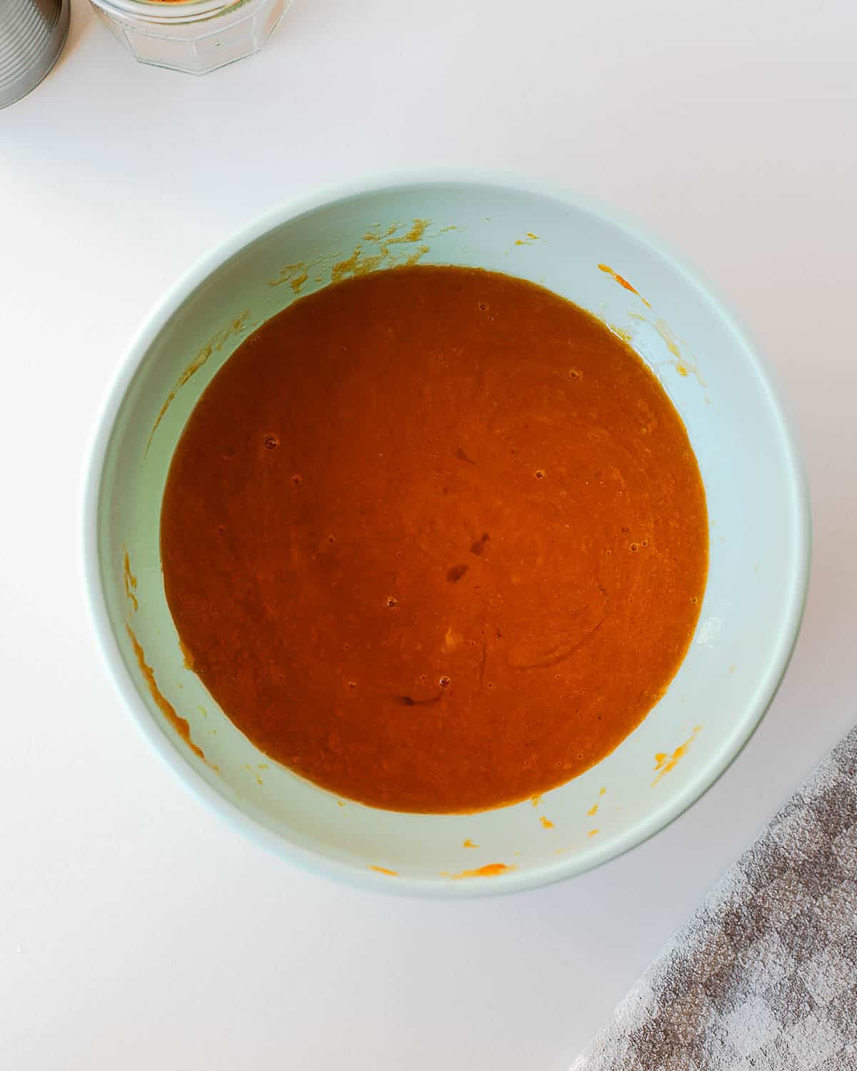 Pumpkin chocolate chip bar batter mixed in a bowl before baking